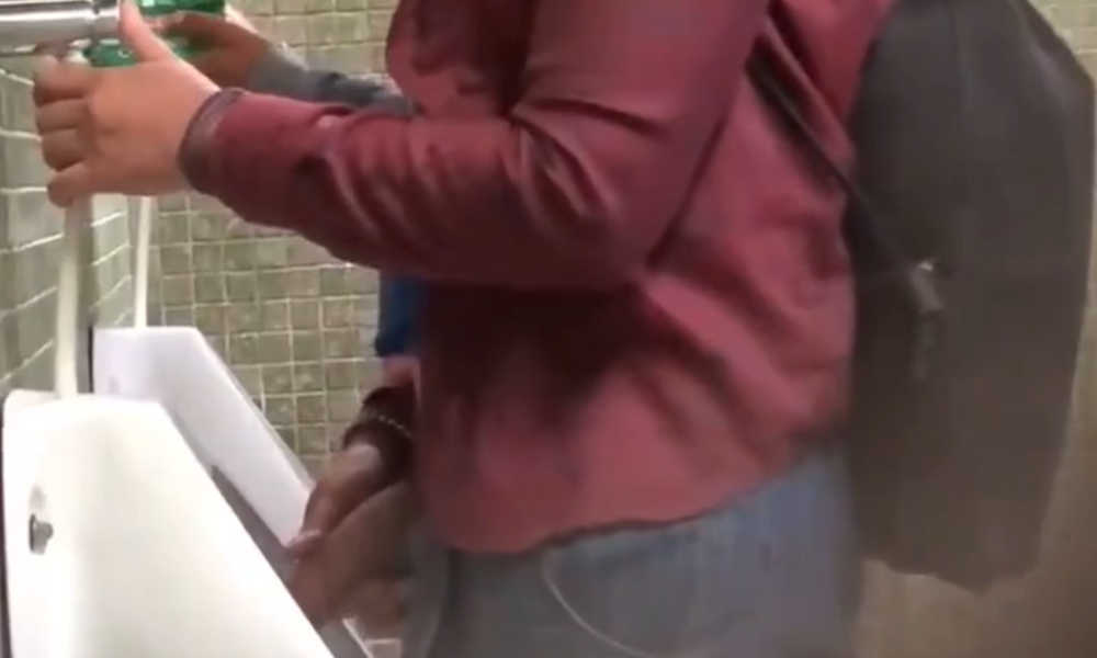 spy on guy with huge cock peeing at urinal