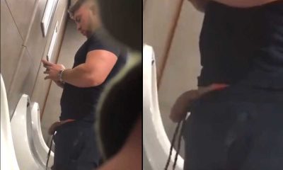 big stud caught pissing at urinals