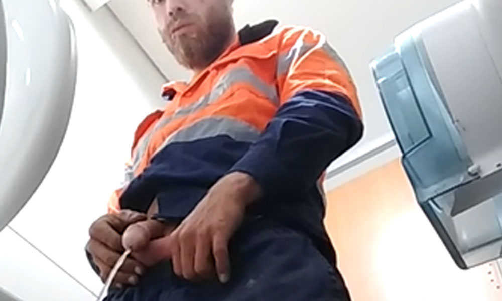 hung worker caught peeing in public toilet