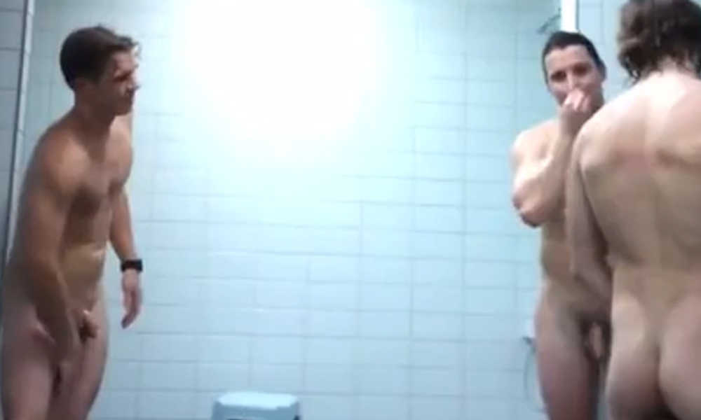 three men caught naked in communal shower by spycam. 