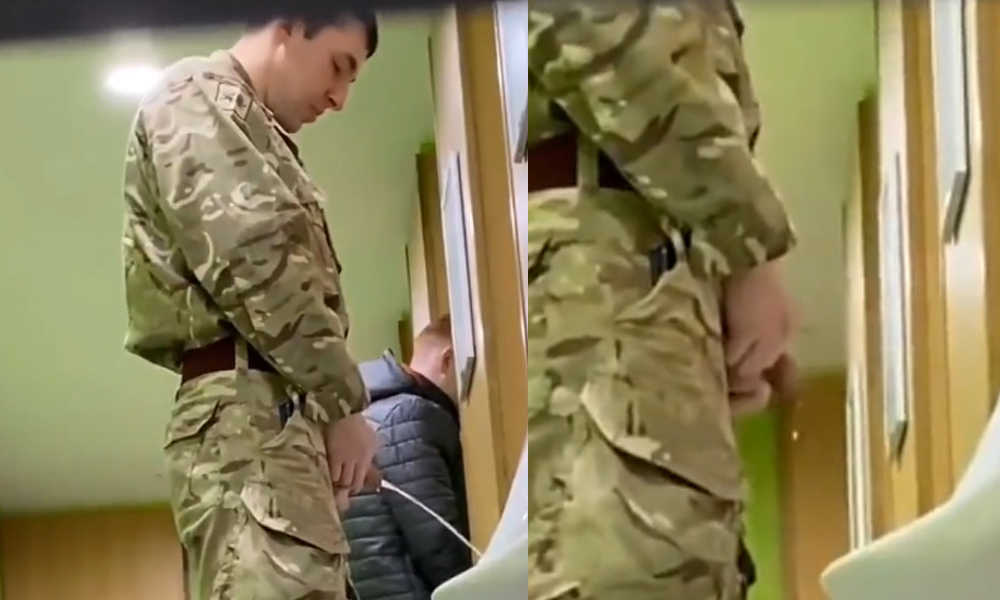 hung military man caught peeing at urinals