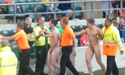 naked streakers being arrested on the pitch during game