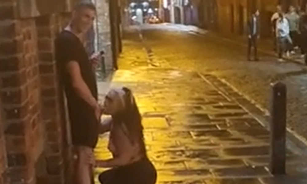 straight guy getting sucked by a girl in public