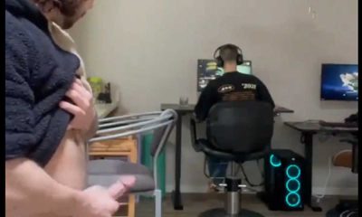 guy jerking off while his room mate is playing videogames