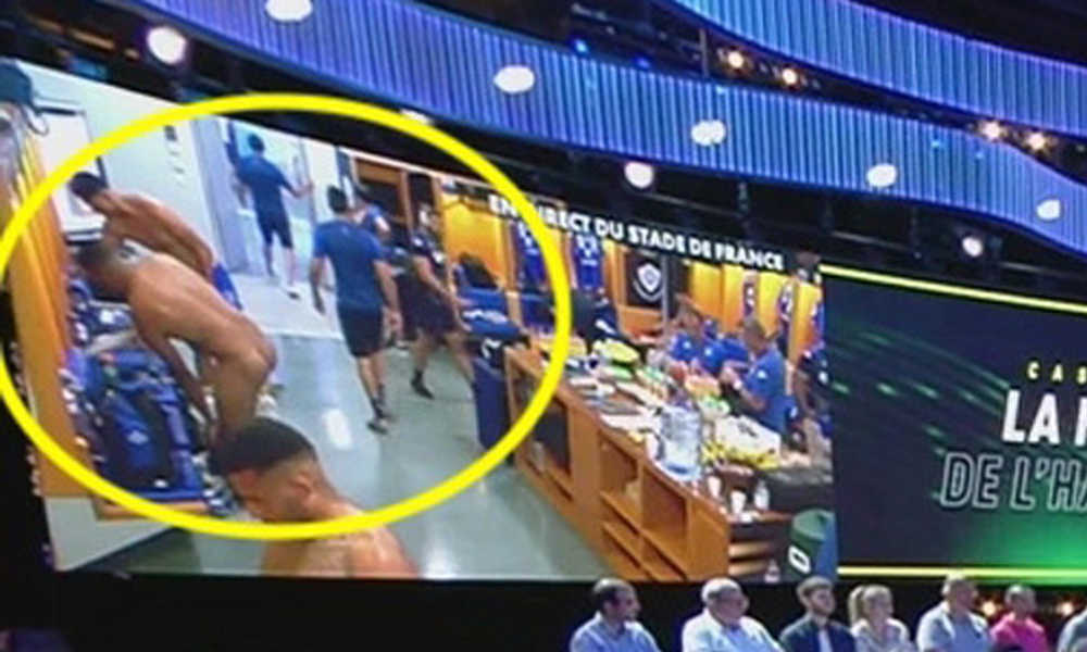 rugby player appears completely naked on TV while undressing in locker room