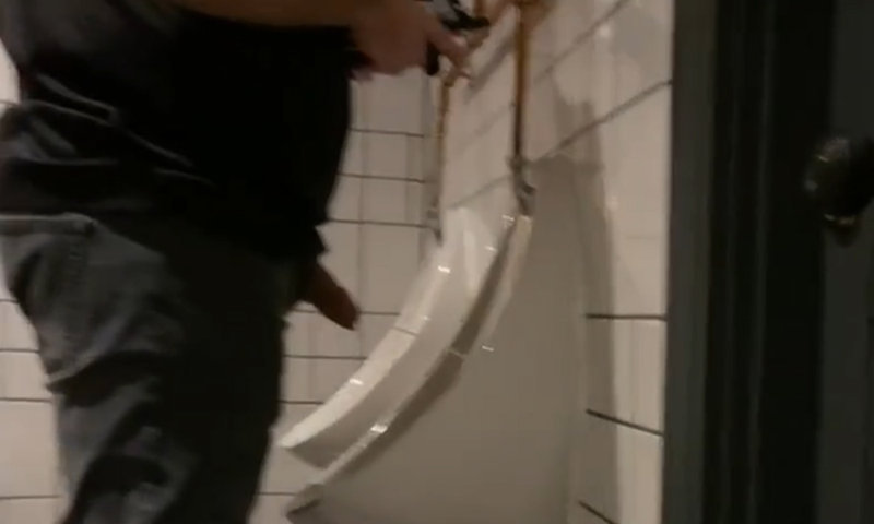 uncut man caught peeing hands free at the urinals