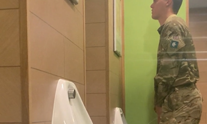 military guy caught peeing at a urinal by spycam