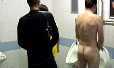 footballers caught peeing at the urinals in the lockerroom