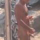 man getting a boner while showering at beach public shower