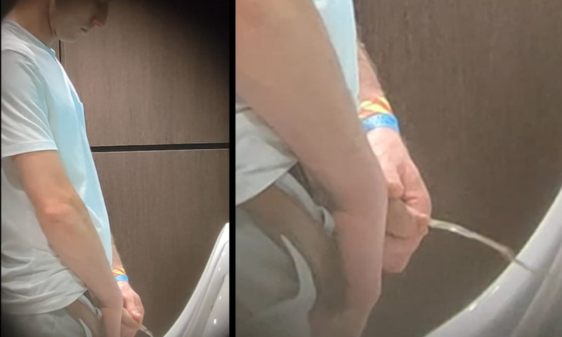 uncut guy captured on video while peeing at urinals