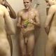 communal shower with lots of naked guys showering together