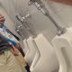 football supporter caught peeing at urinals by spycam