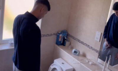 hung guy caught peeing in the bathroom