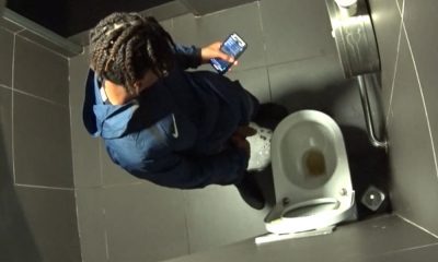 black dude caught peeing in public toilet by spy camera