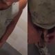 Bearded dude caught peeing in a public toilet