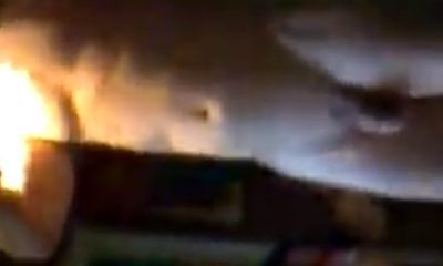 Footballer completely naked in locker room during a celebration