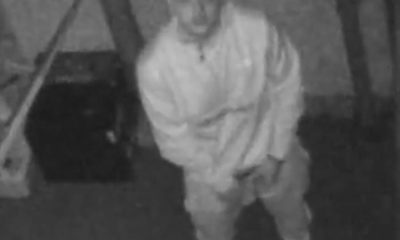 Guy caught peeing in backyard by surveillance camera