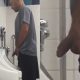 Guy with monster cock caught peeing at urinals