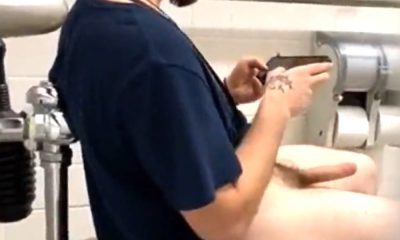Scruffy guy caught wanking in public toilet
