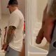 Tattooed guy caught peeing at stadium urinals