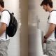 Tall boy caught peeing at restroom urinals