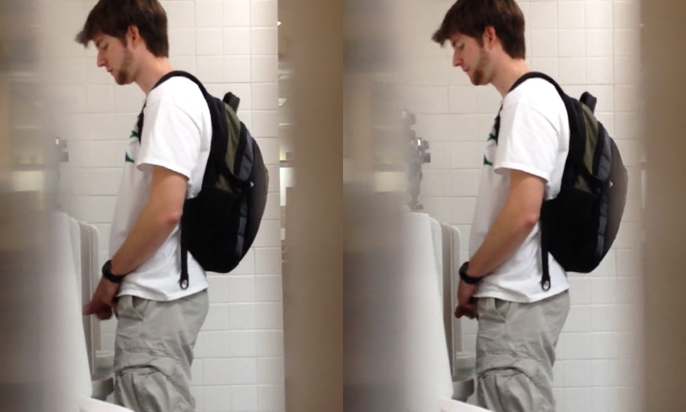 Tall boy caught peeing at restroom urinals