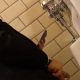 Guy in suit caught peeing at the urinals