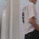 Tattooed guy with big cock caught peeing at urinals