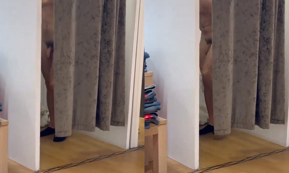 Naked guy in a shop fitting room
