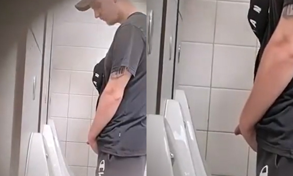 Sporty lad pulling out his dick and peeing at urinals