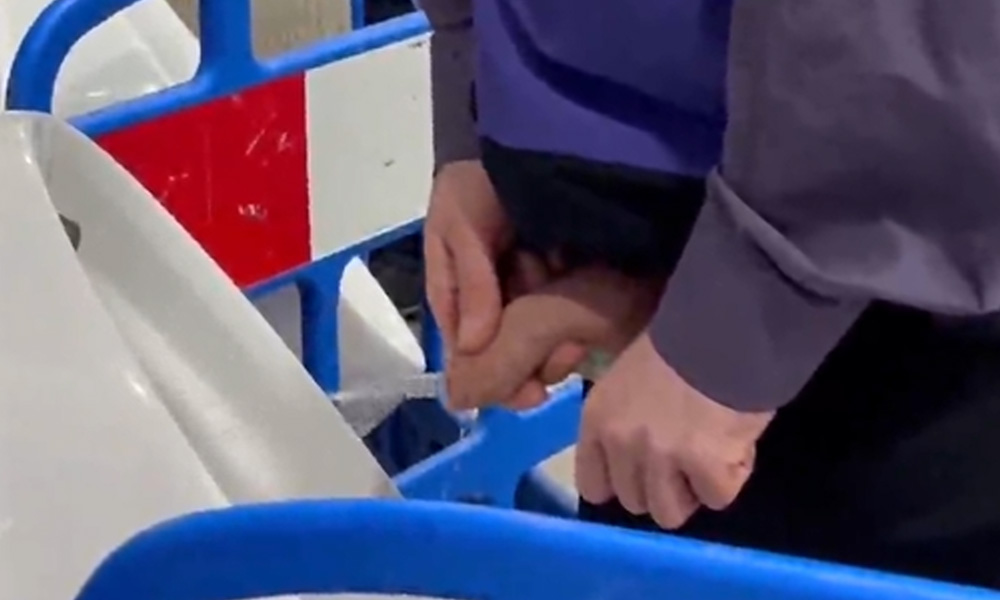 Man with fat uncut cock peeing at urinals