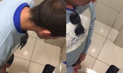 guy caught peeing public toilet