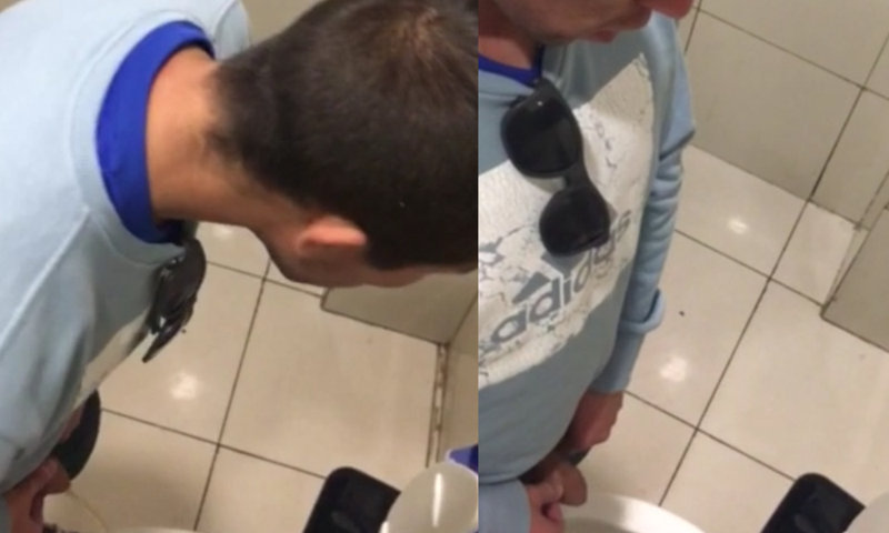 guy caught peeing public toilet