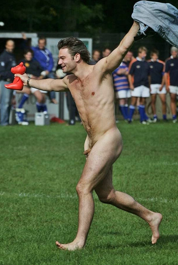 streaker running naked on the pitch.