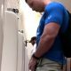 muscled stud caught peeing urinals