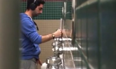 guy with huge cock caught peeing at urinal