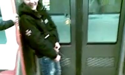 drunk guy caught peeing in subway