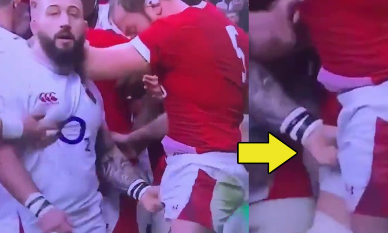 rugby player grabbing mate crotch