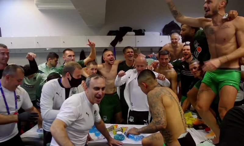 Footballers in underwear in locker room