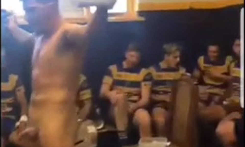 rugby player with cock out for locker room celebration