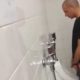 hidden cam spying on guy peeing urinal