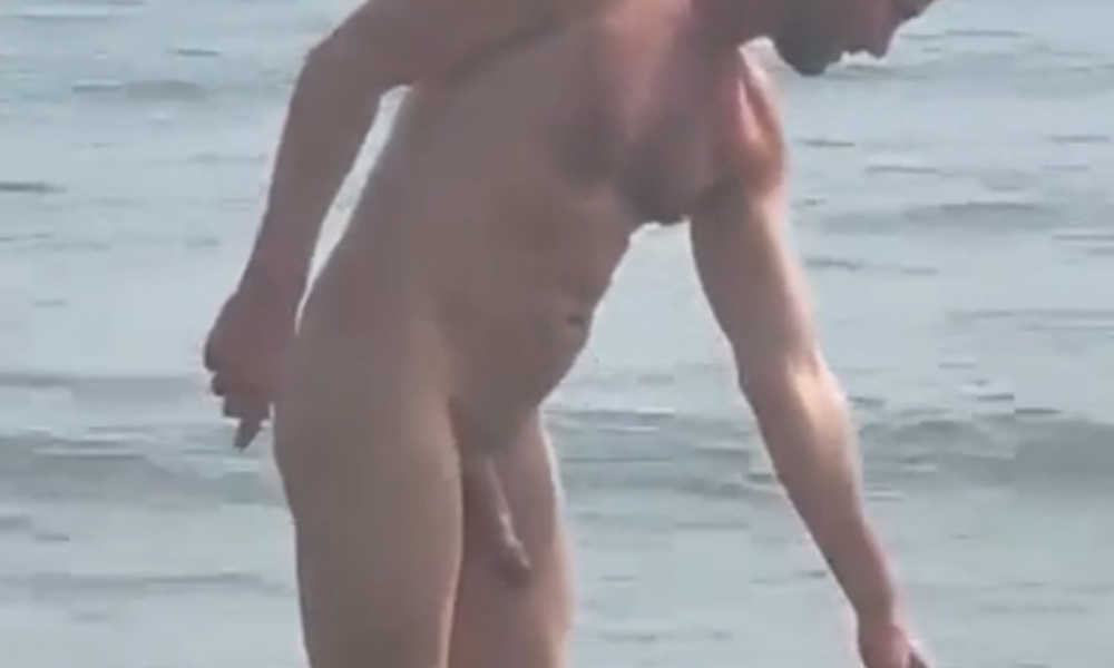 hung nudist man in the sea