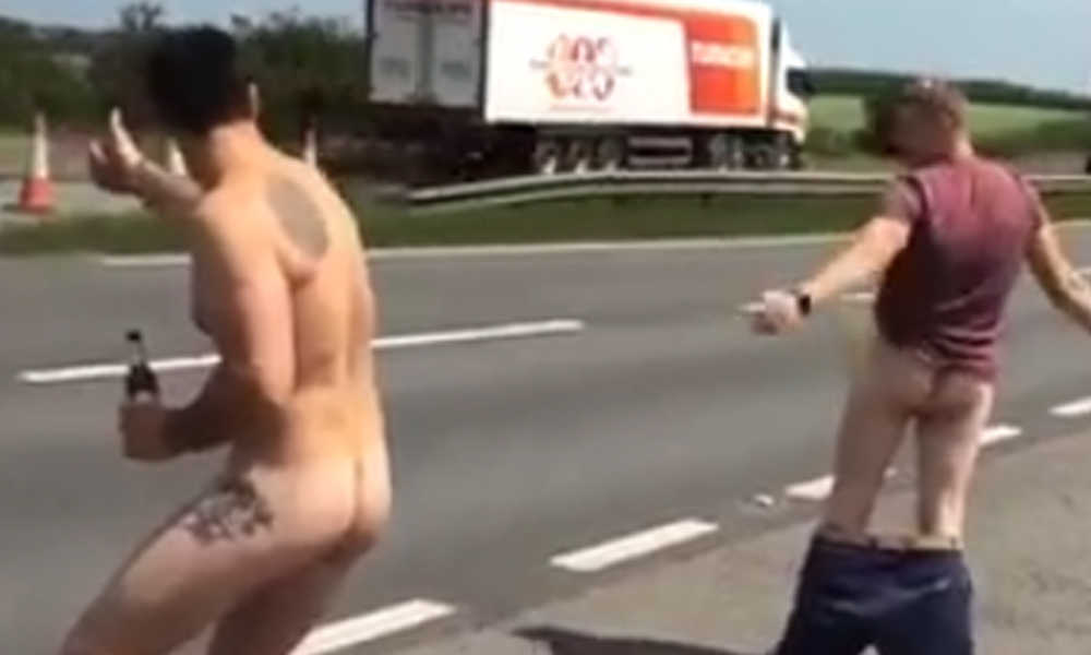 two guys flashing cocks and butts on the road