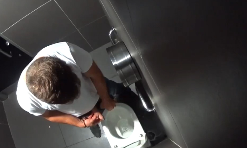 taking a pee in the public restroom Here’s another guy who was ca...