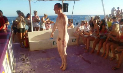 straight guy naked on a boat in front of the girls