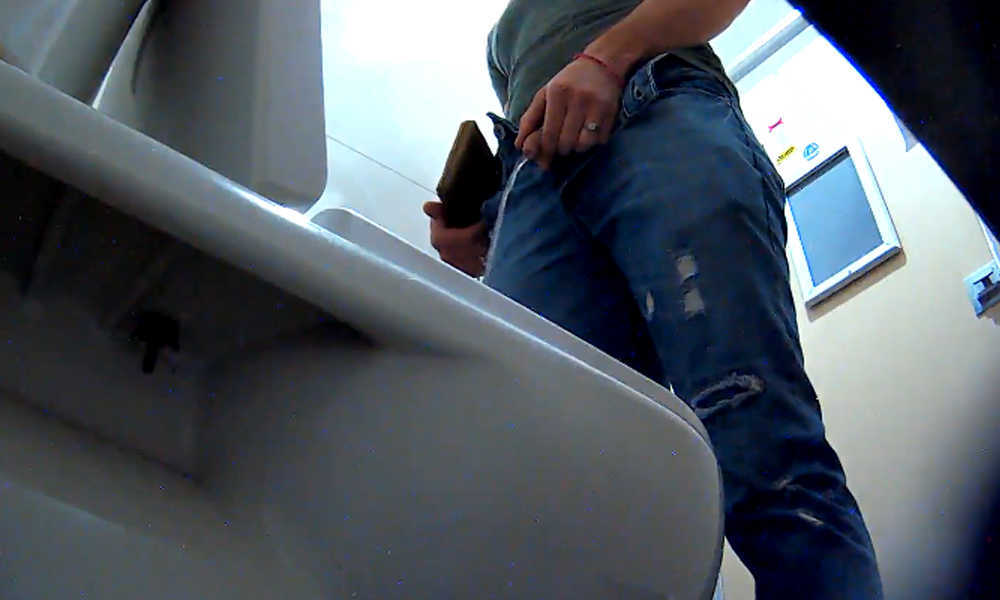 uncut guy caught peeing in public toilet