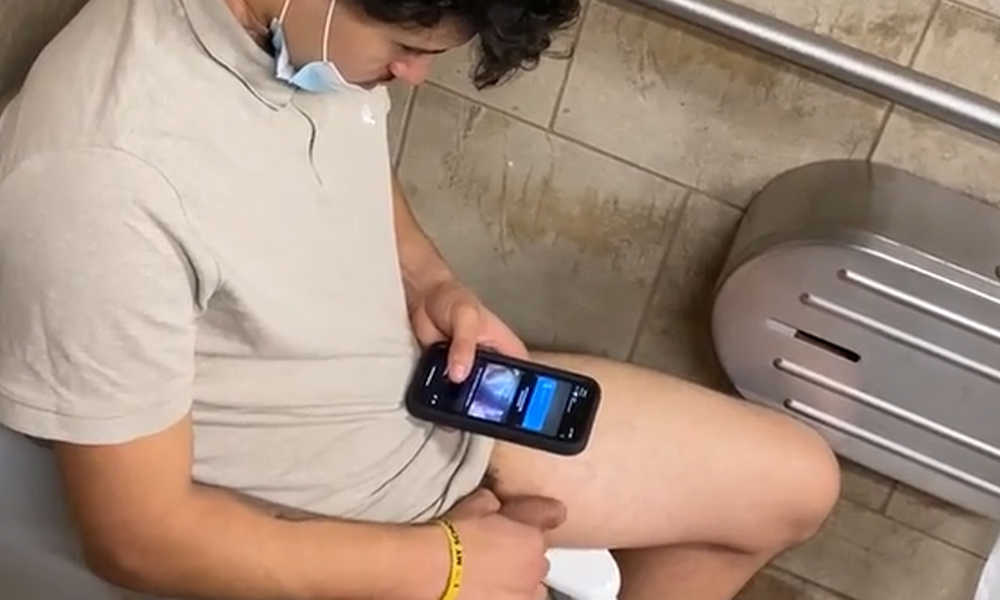 guy caught stroking his hairy cock in public toilet