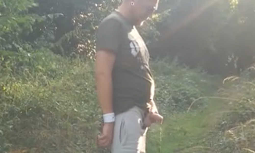 guy filming his friend peeing in public
