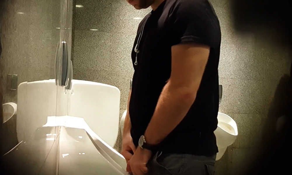 uncut guy peeing and spitting urinal