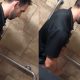 horny guy caught stroking his cock in public toilet